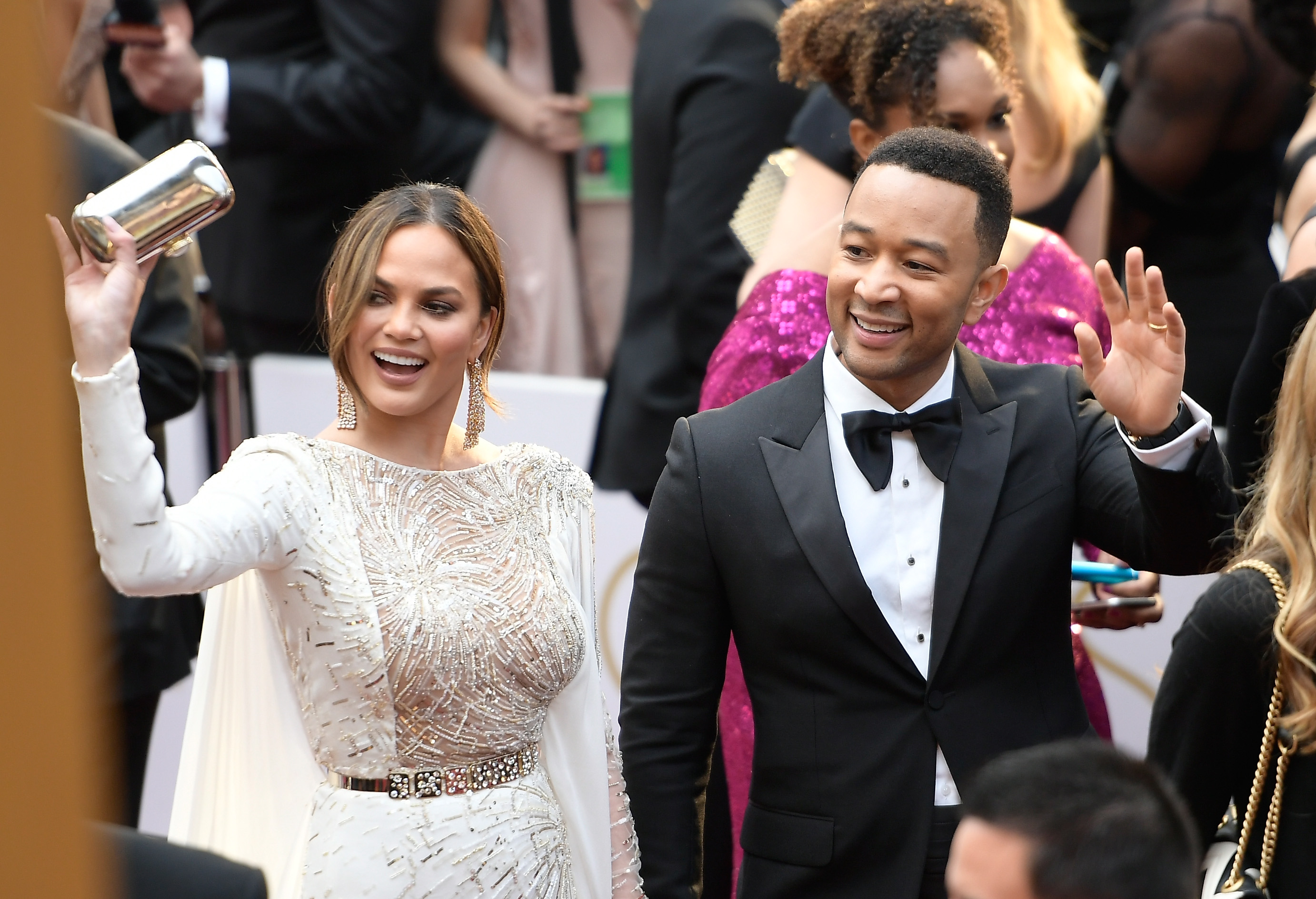Christy Teigen appeared to be asleep on John Legend's shoulder as Emma Stone was announced as the Best Actress Academy Award winner for "La La Land."