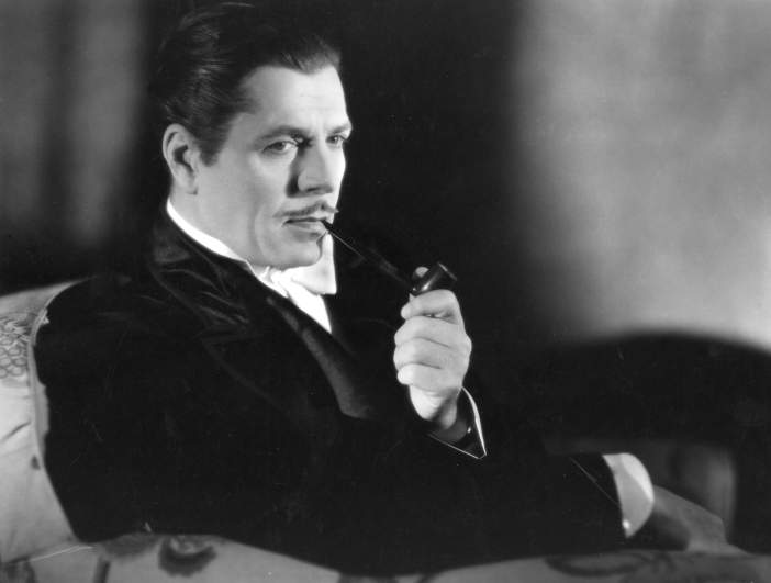 Smoking jacket, Warner Baxter