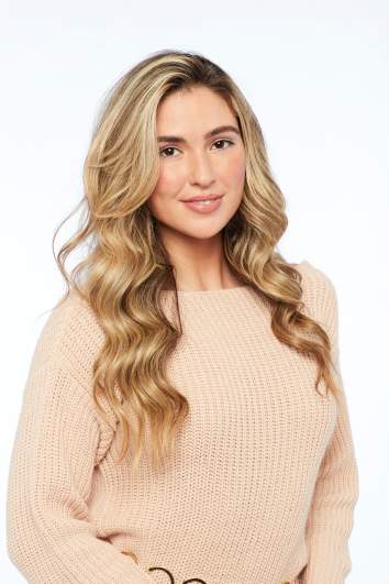 Illeana from 'The Bachelor' in a cream blouse.