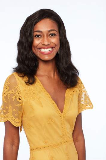 The Bachelor star Sydney wearing a yellow dress.