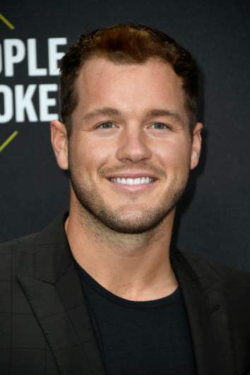 Colton Underwood wearing a black shirt.