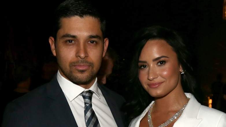 Actor Wilmer Valderrama (L) and singer Demi Lovato attend The 58th GRAMMY Awards