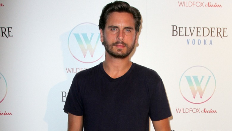Scott Disick wearing a black shirt.