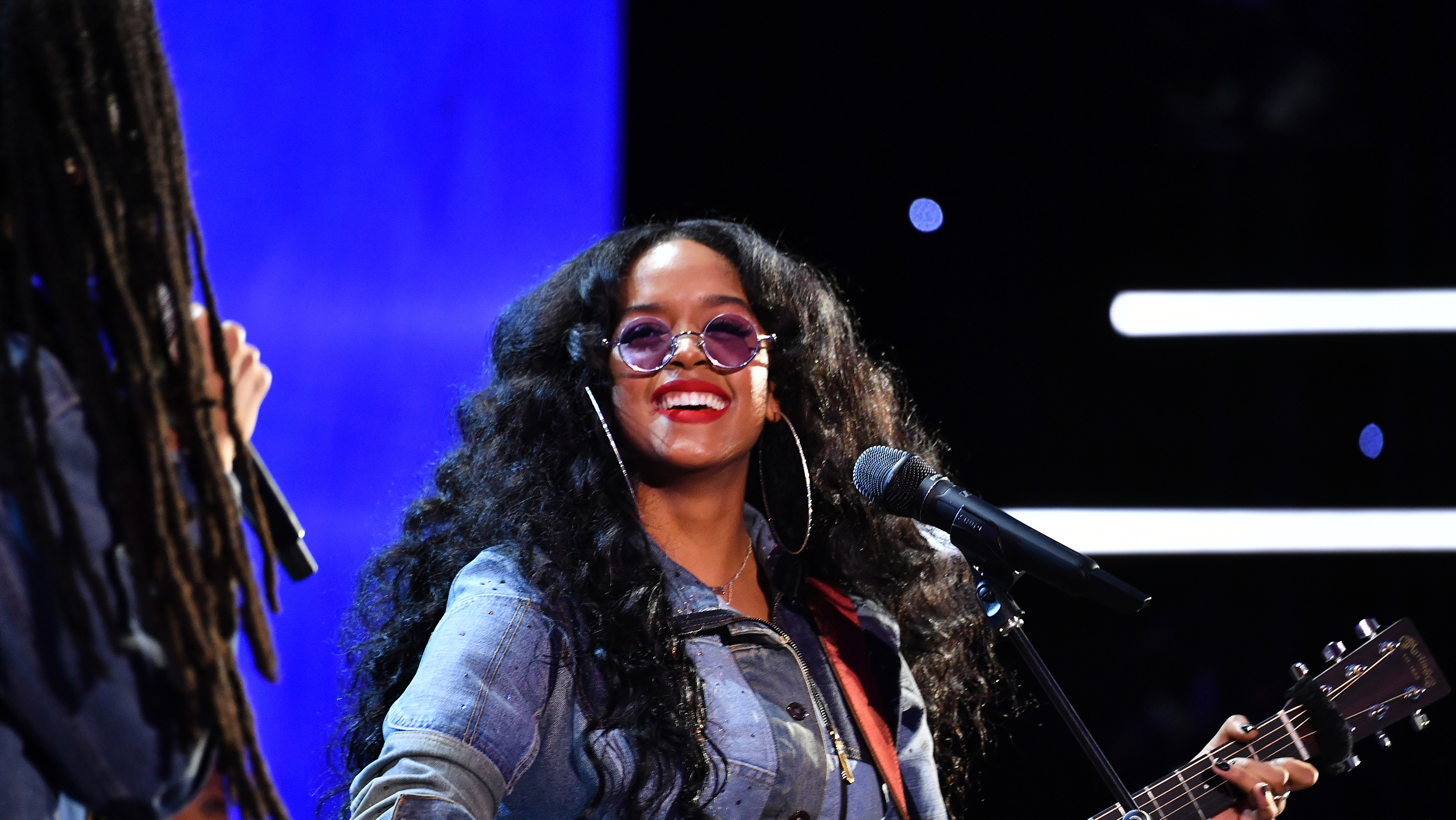 Why Does H.E.R. Always Wear Sunglasses?