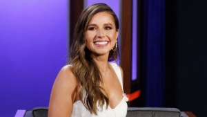 Katie Thurston in a white dress.