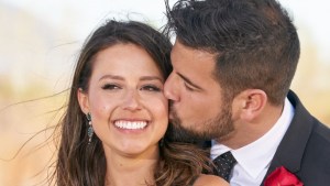 Blake Moynes kissing Katie Thurston's cheek.