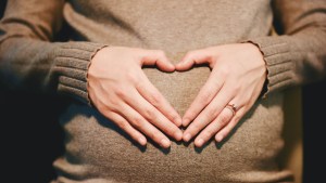 A pregnant woman.