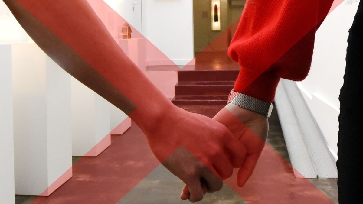 A couple holding hands