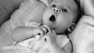 A baby yawning