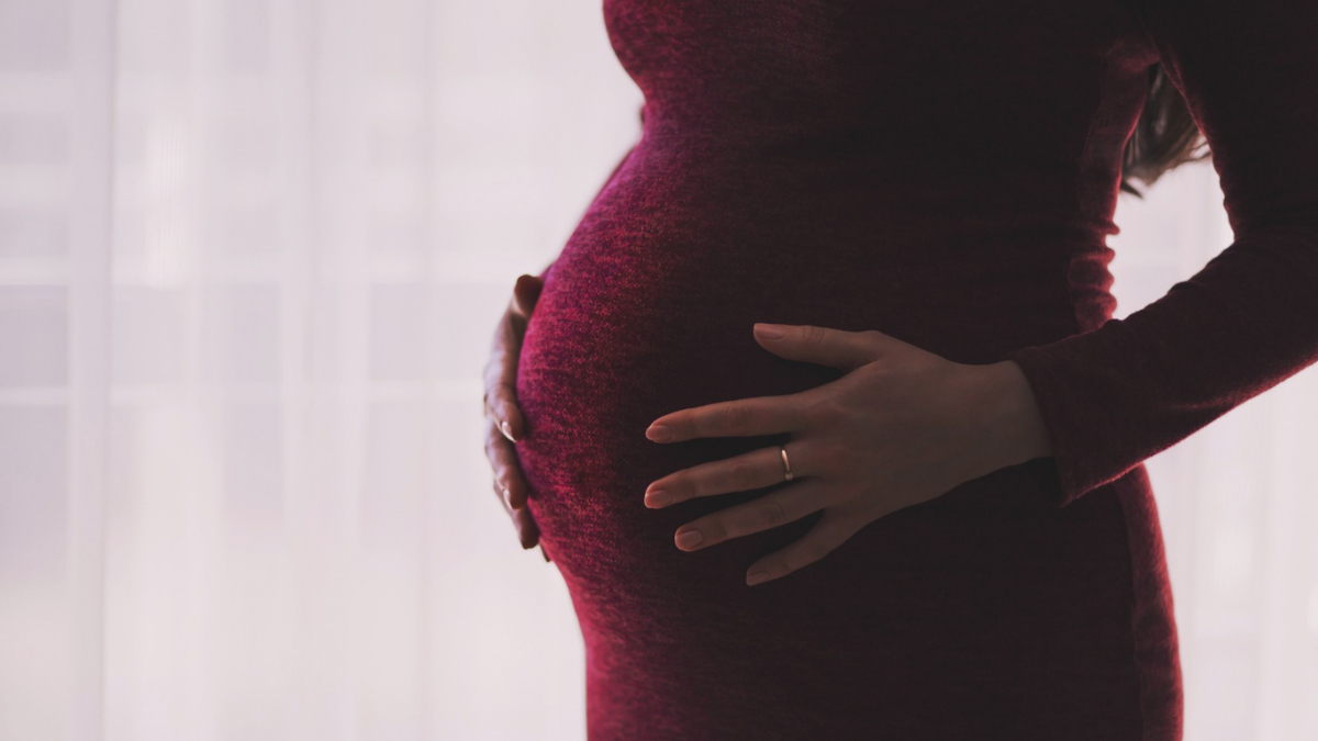 A pregnant woman.
