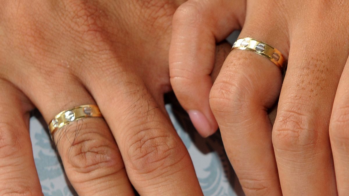 A couple and their wedding rings