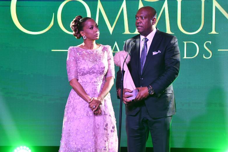 Honorees Holly Robinson Peete and Rodney Peete speak onstage during the 2023 Beloved Community Awards at Hyatt Regency Atlanta.