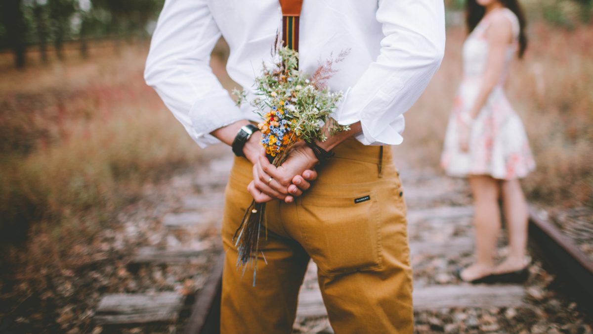 Bouquet behind back
