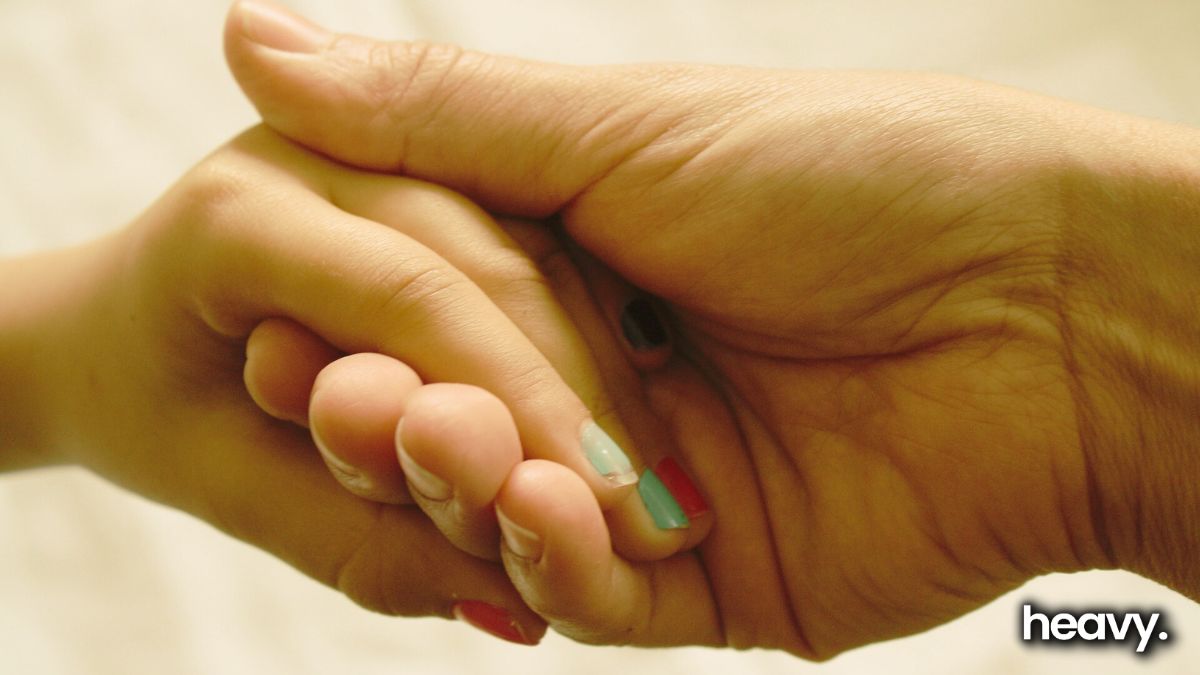 Mother and daughter's hands.