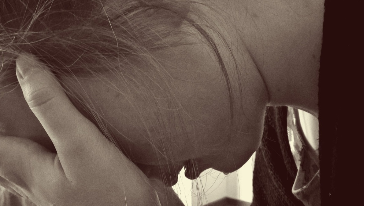 A woman crying.