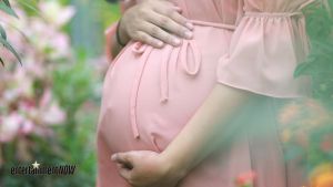 A pregnant woman.