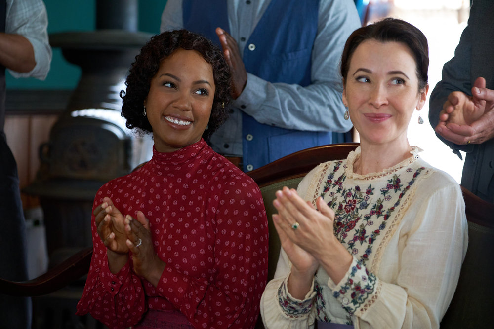 Hope Valley residents look happy in a town meeting