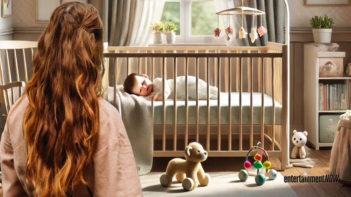 A woman looking at a baby.