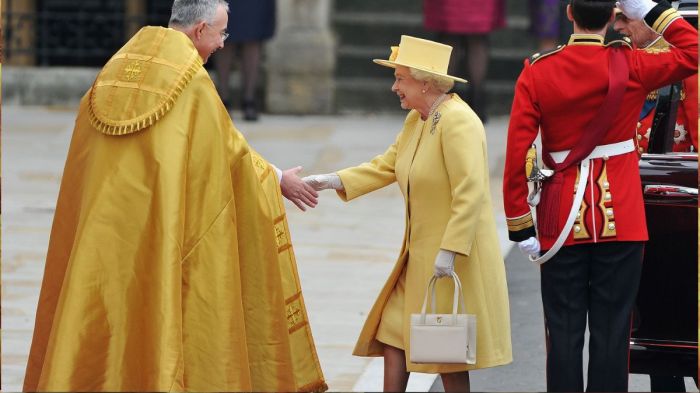 Queen Elizabeth II and Prince Philip, Duke of Edinburgh arrive to attend the Royal Wedding of Prince William to Catherine Middleton at Westminster Abbey on April 29, 2011 in London, England