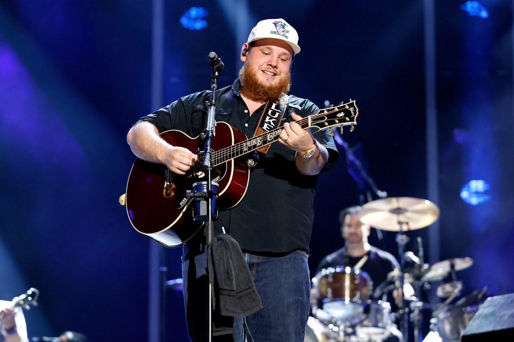Luke Combs playing guitar