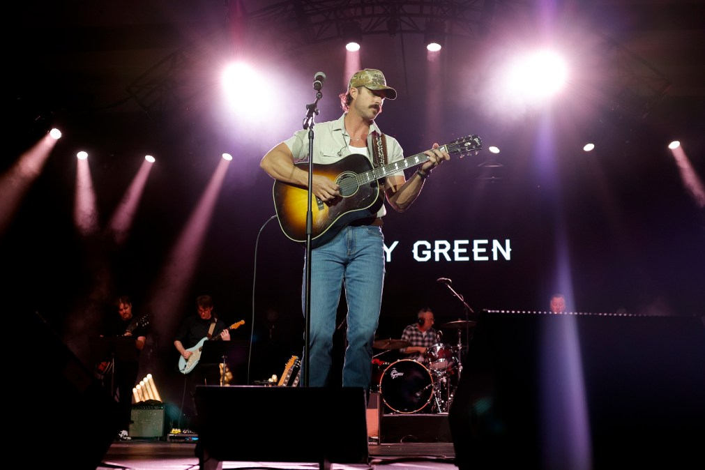 Riley Green performing on stage