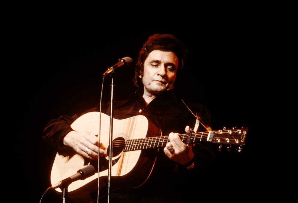 Johnny Cash playing guitar