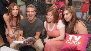 Andy Cohen (second from left) signs copies of his book for Carole Radziwill,Caroline Manzo and Jacqueline Laurita