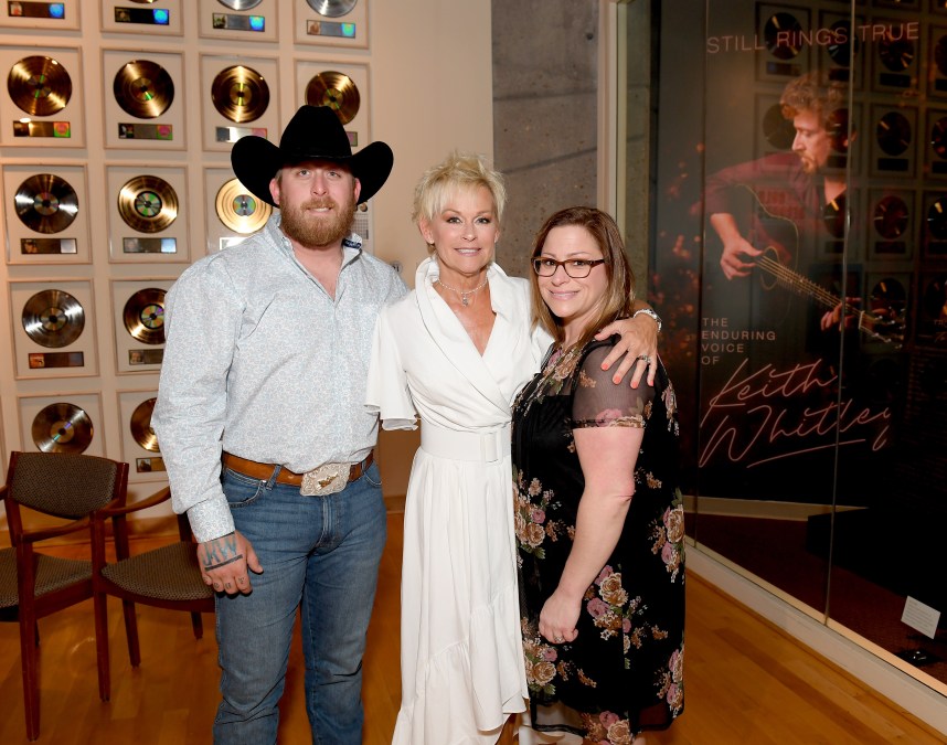 Jesse Keith Whitley and his family standing together