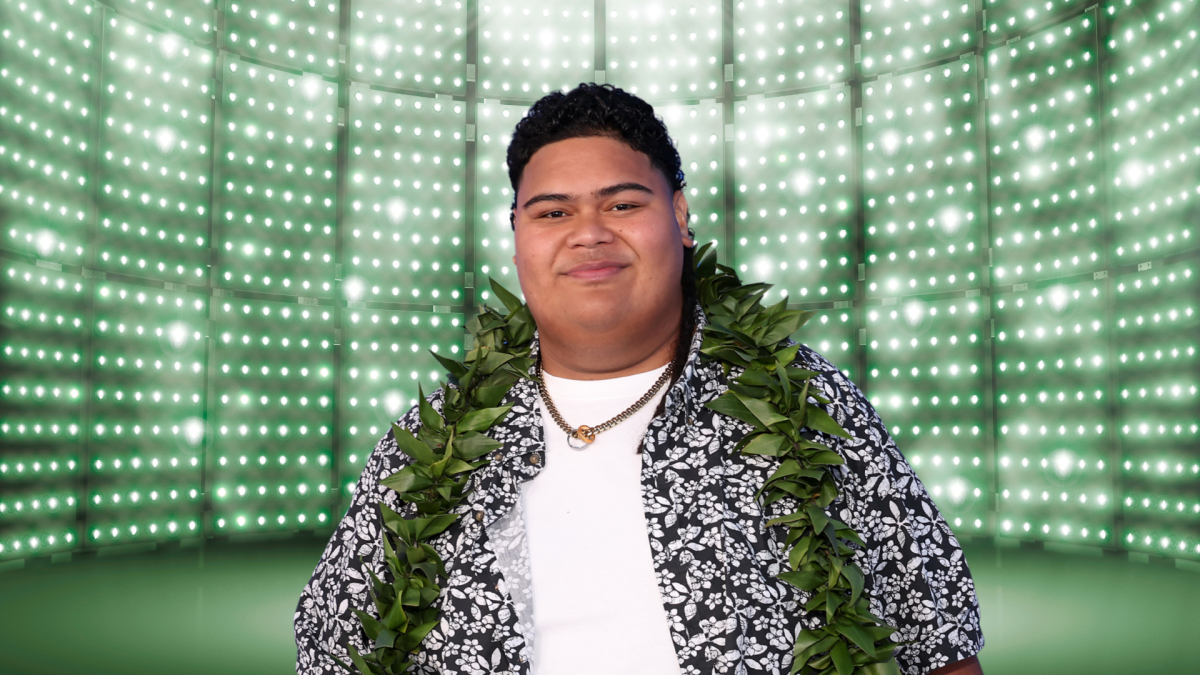 Iam Tongi posing on stage