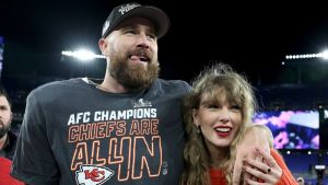 Travis Kelce #87 of the Kansas City Chiefs celebrates with Taylor Swift after a 17-10 victory against the Baltimore Ravens in the AFC Championship Game at M&T Bank Stadium on January 28, 2024