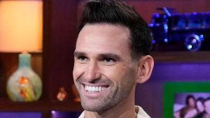 Summer House star Carl Radke smiles during an appearance on WWHL