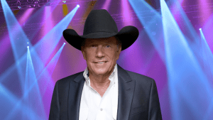 George Strait posing in a cowboy hat.