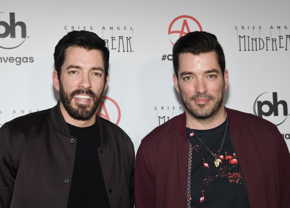 Drew and Jonathan Scott posing together.