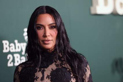 Kim Kardashian Playfully Claps Back at Rumor She Left North in Paris Hotel