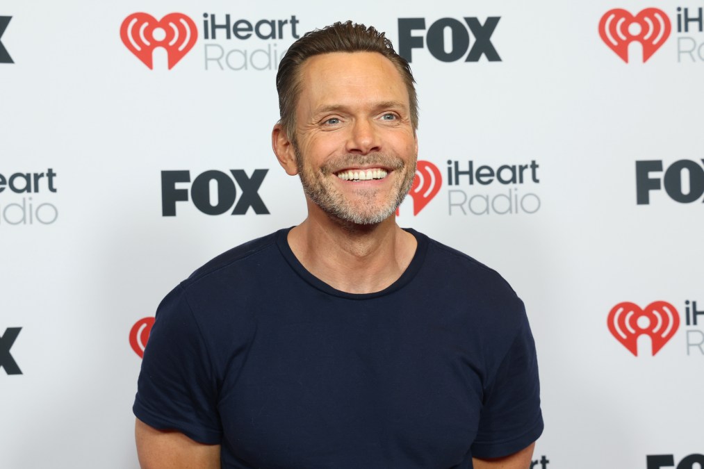 Joel McHale smiling for a photo