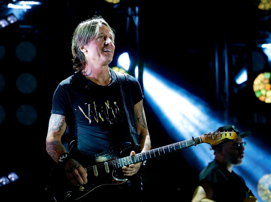 Keith Urban smiling on stage