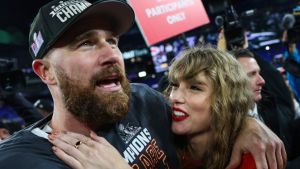 Travis Kelce #87 of the Kansas City Chiefs (L) celebrates with Taylor Swift after defeating the Baltimore Ravens in the AFC Championship Game at M&T Bank Stadium on January 28, 2024