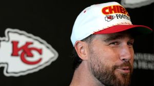 Travis Kelce #87 of the Kansas City Chiefs talks with the media after a mandatory minicamp at The University of Kansas Health System Training Complex on June 18, 2025