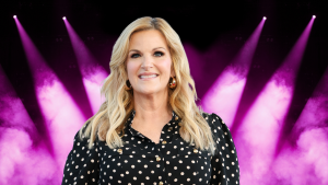 Trisha Yearwood smiling in a polka dot outfit.