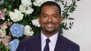 Alfonso Ribeiro smiling at an event