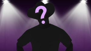 silhouette of man in cowboy hat under stage lights
