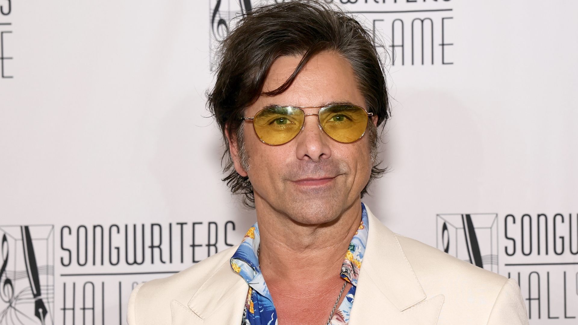 PHOTOS: John Stamos 'Heartbroken' Over Tristan Roger's Death