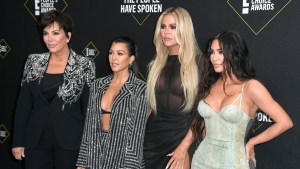 Kardashian sisters pose for photos at event