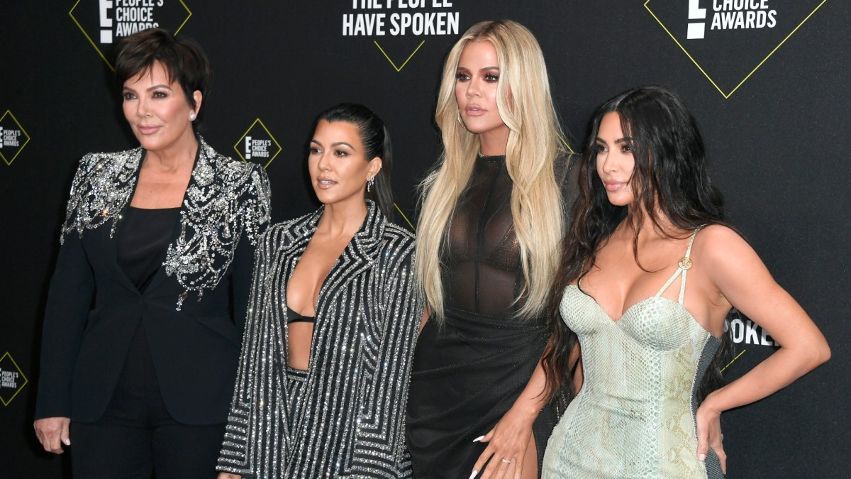 Kardashian sisters pose for photos at event