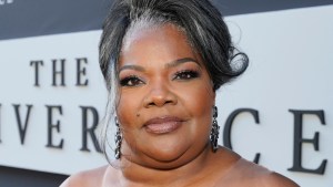 Mo’Nique smiling at an event for "The Deliverance"