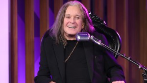 Ozzy Osbourne speaking into microphone