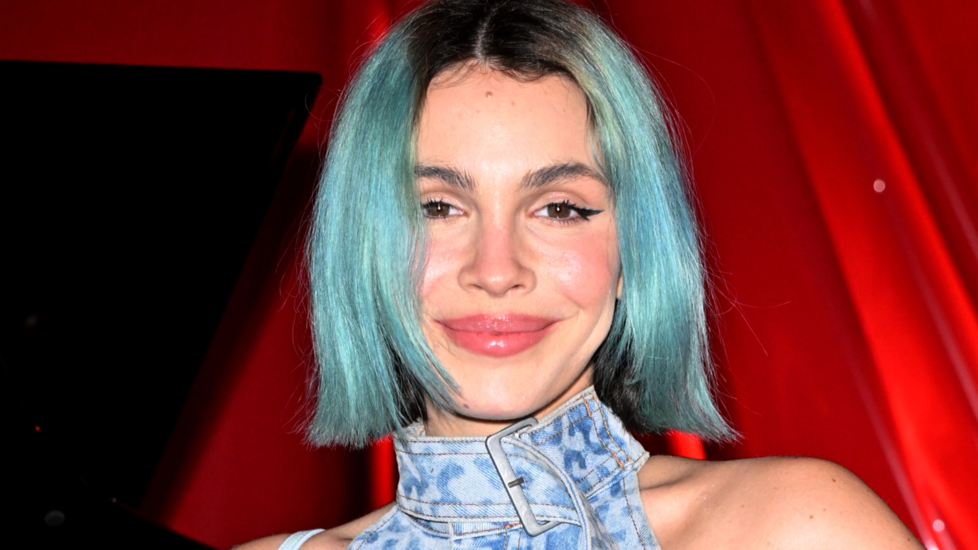 Rose Villain smiling at fashion event