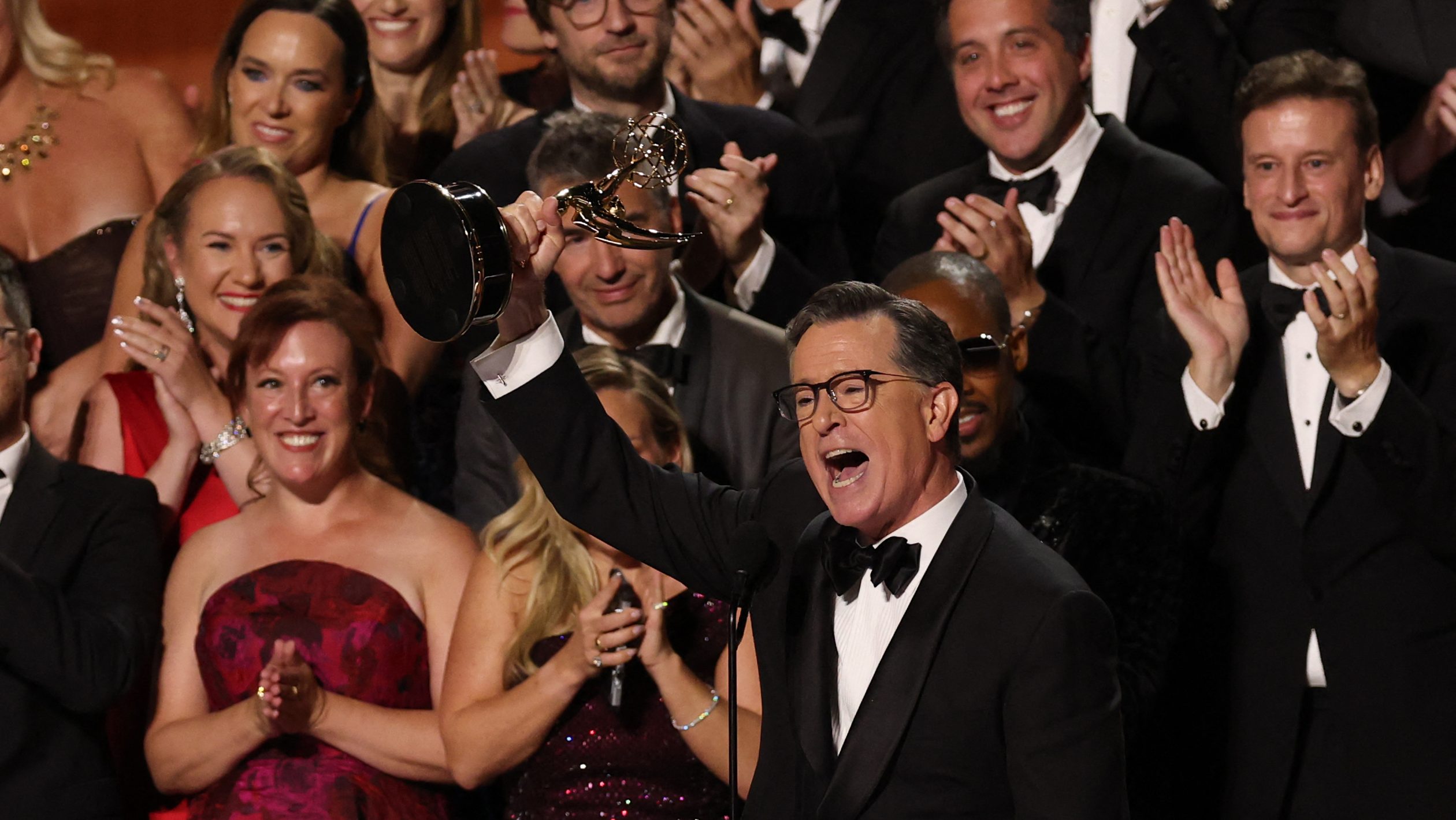 US comedian writer Stephen Colbert accepts the Outstanding Talk Series award