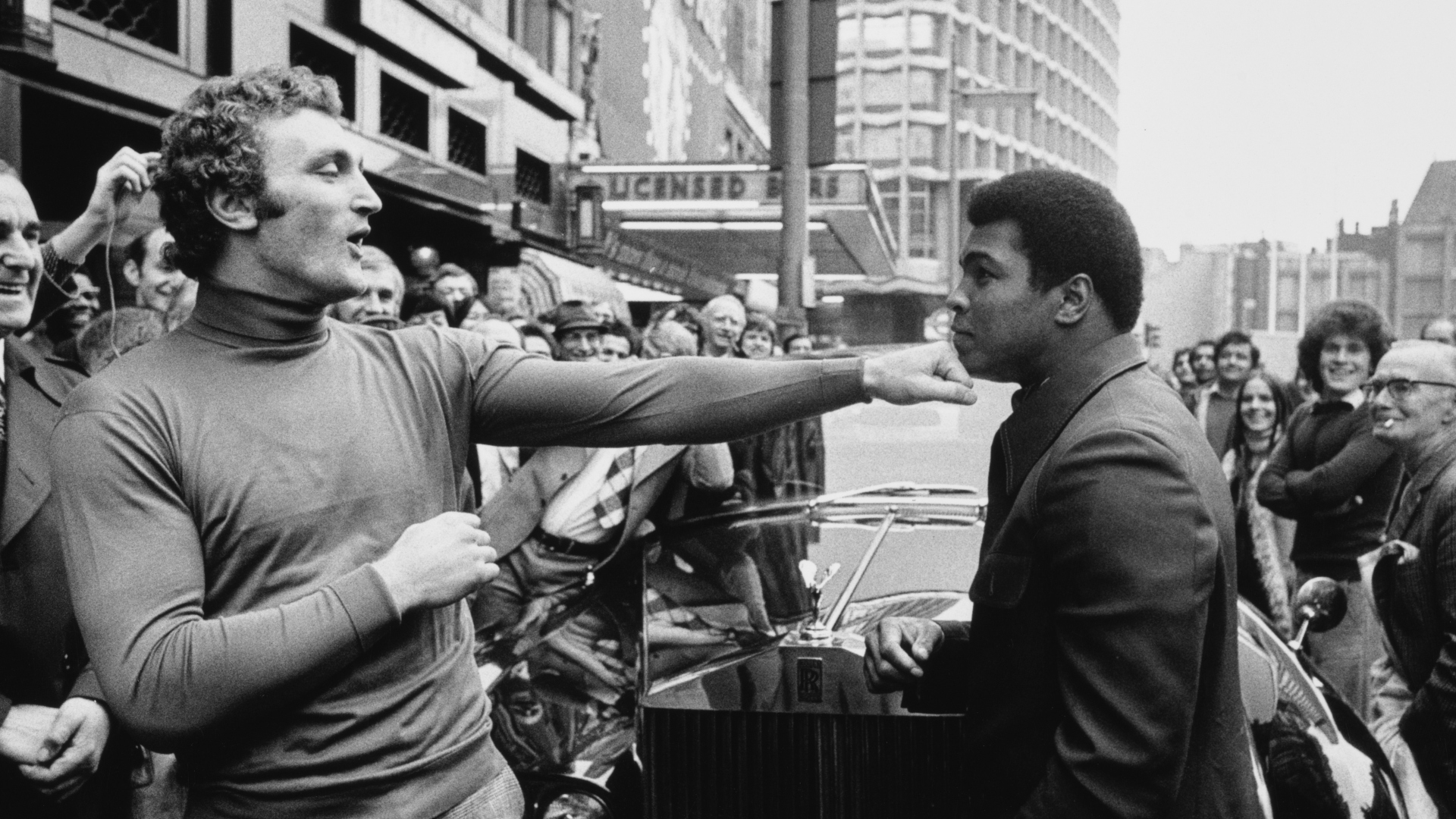 Joe Bugner and Muhammad Ali pretending to box