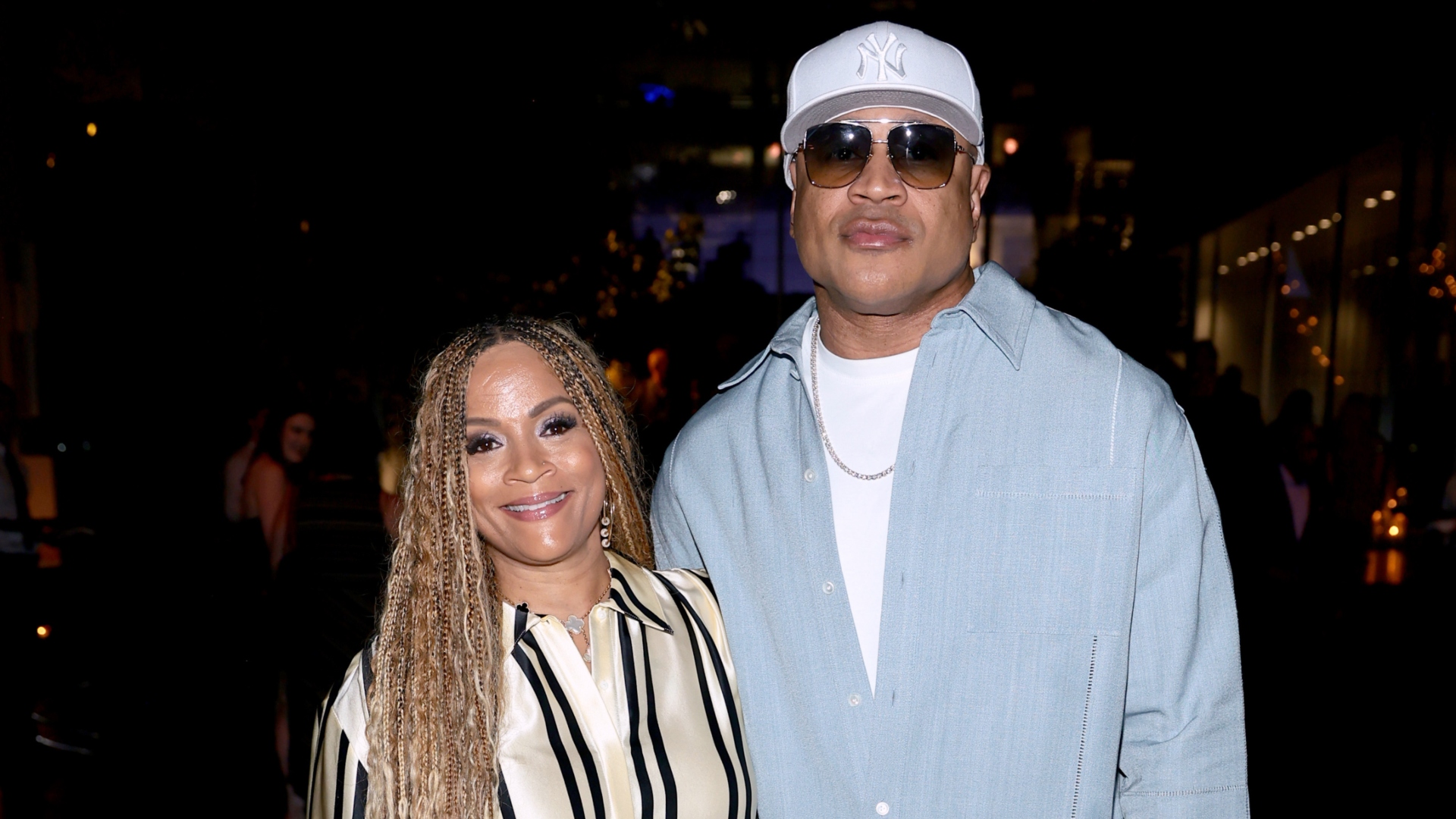 Simone Smith, smiling, and LL Cool J